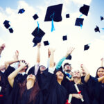 Graduation Caps Thrown Happiness Success Concept
